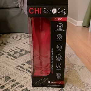 CHI Spin n Curl 1.25” rotating curler. Used twice. Works great!